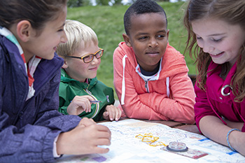 Children working with a map.